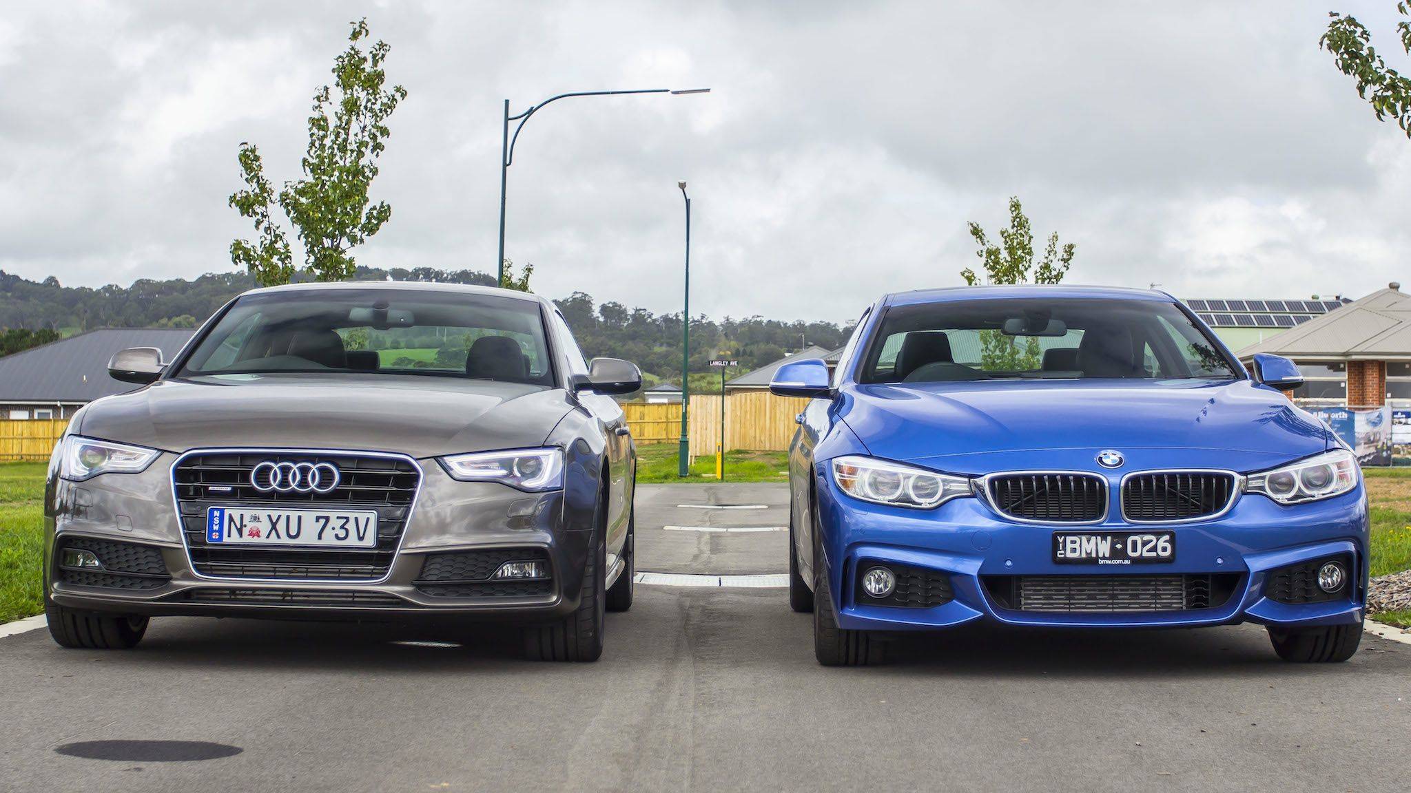 Практично или комфортно: BMW 5 против Audi A4